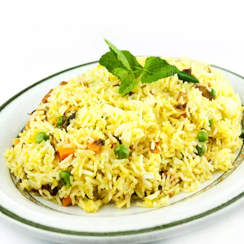 Vegetable Biryani at Indian BBQ & Grill Red Deer - Fragrant basmati rice with mixed vegetables and aromatic spices, vegetarian delight