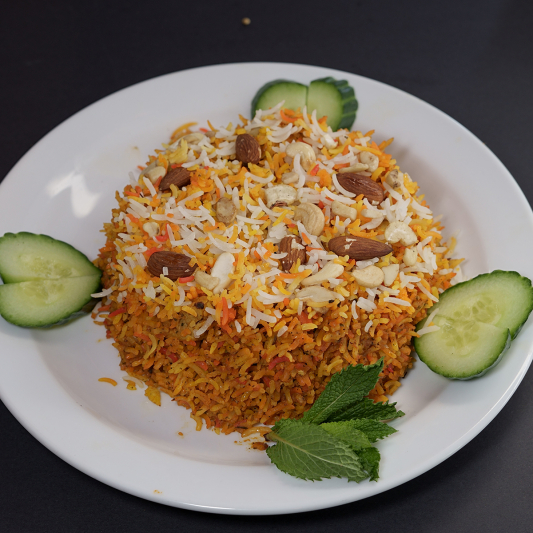 Lamb Biryani at Indian BBQ & Grill Red Deer - Aromatic basmati rice with tender lamb and traditional spices