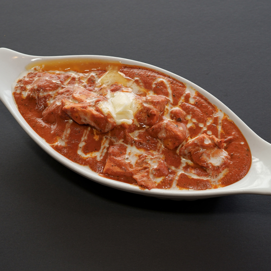 Butter Chicken at Indian BBQ & Grill Red Deer - Classic creamy tomato curry with tandoori chicken